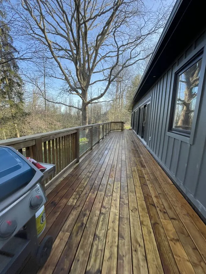 Long cedar deck after pressure washing